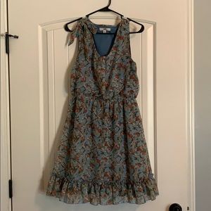 Floral patterned dress with bow and ruffle
